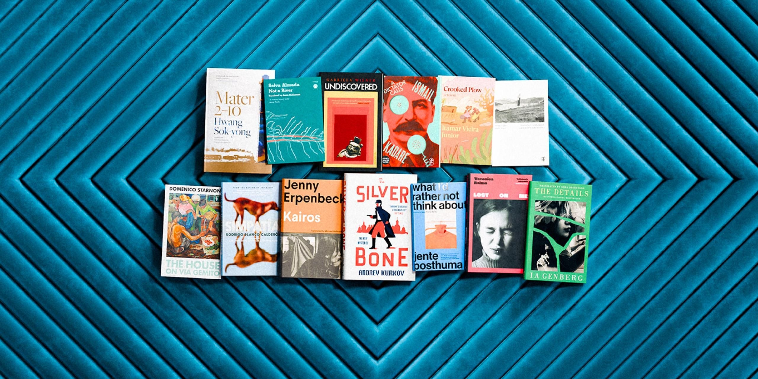 The International Booker Prize longlist books photograph, shot top down.