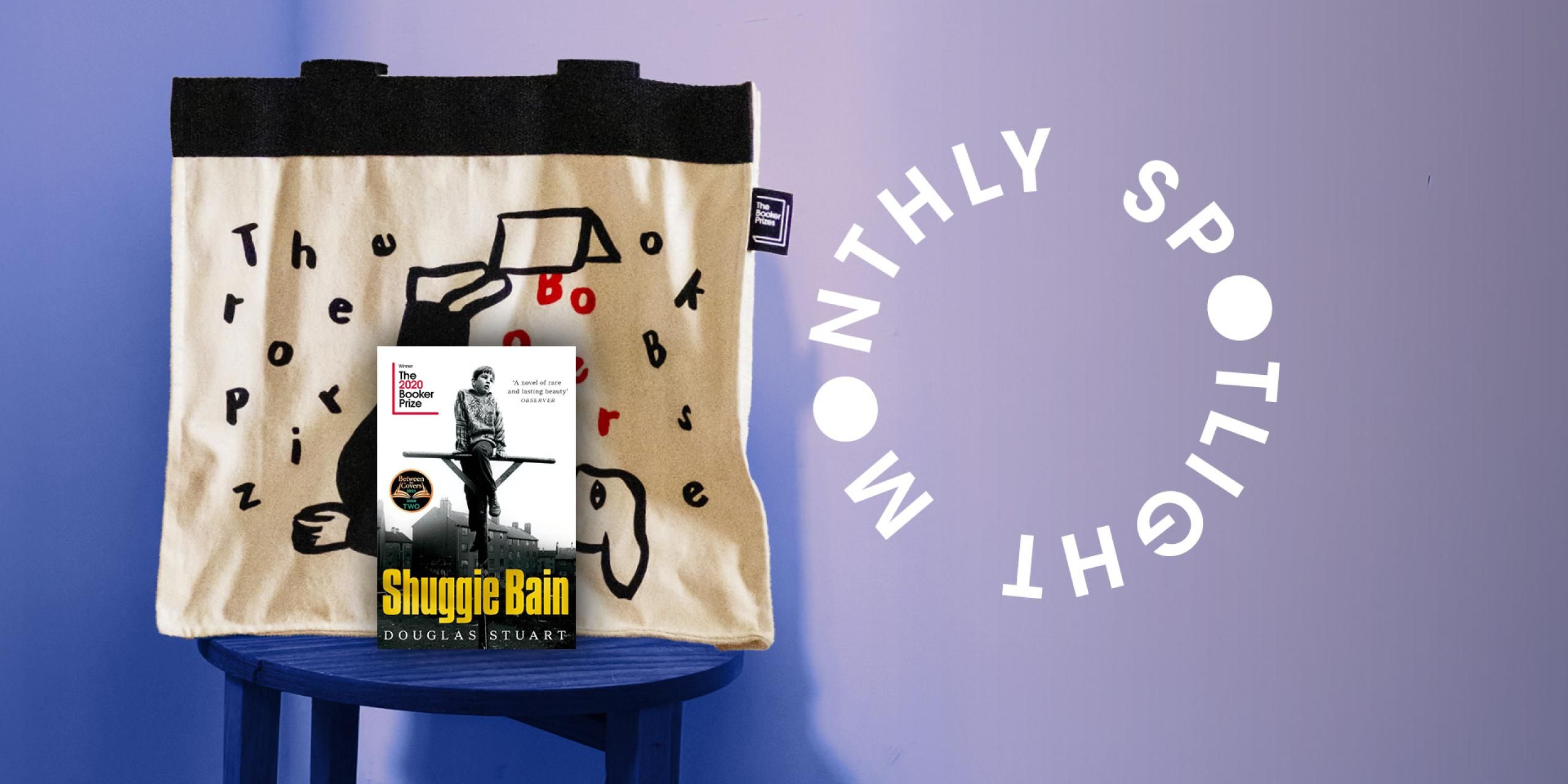 A Booker Prize tote bag with the cover of Shuggie Bain and text saying Monthly Spotlight in a circle