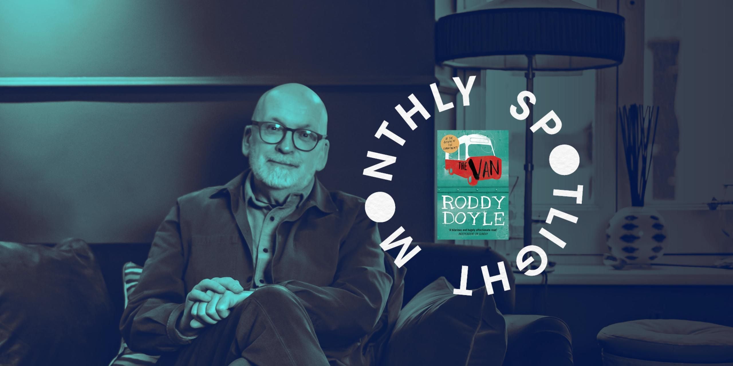 Roddy Doyle is sat down, looking at the camera. He is bald with round spectacles. He is wearing a jacket over a shirt and has his arms crossed. There is a blue overlay and the monthly spotlight circling the image of the book cover. 