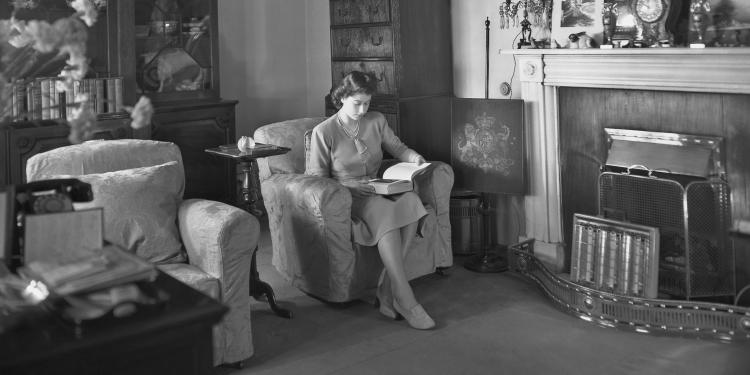 Princess Elizabeth reading a book in Buckingham Palace on July 19, 1946