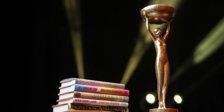 Iris, the Booker Prize trophy and Booker Prize 2023 shortlisted books