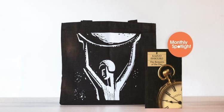 A black bag the Booker Prize print behind the 'Remains of the Day' book.