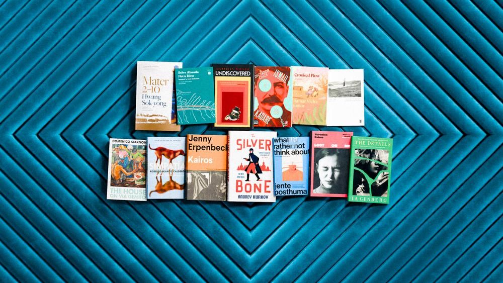 The International Booker Prize longlist books photograph, shot top down.