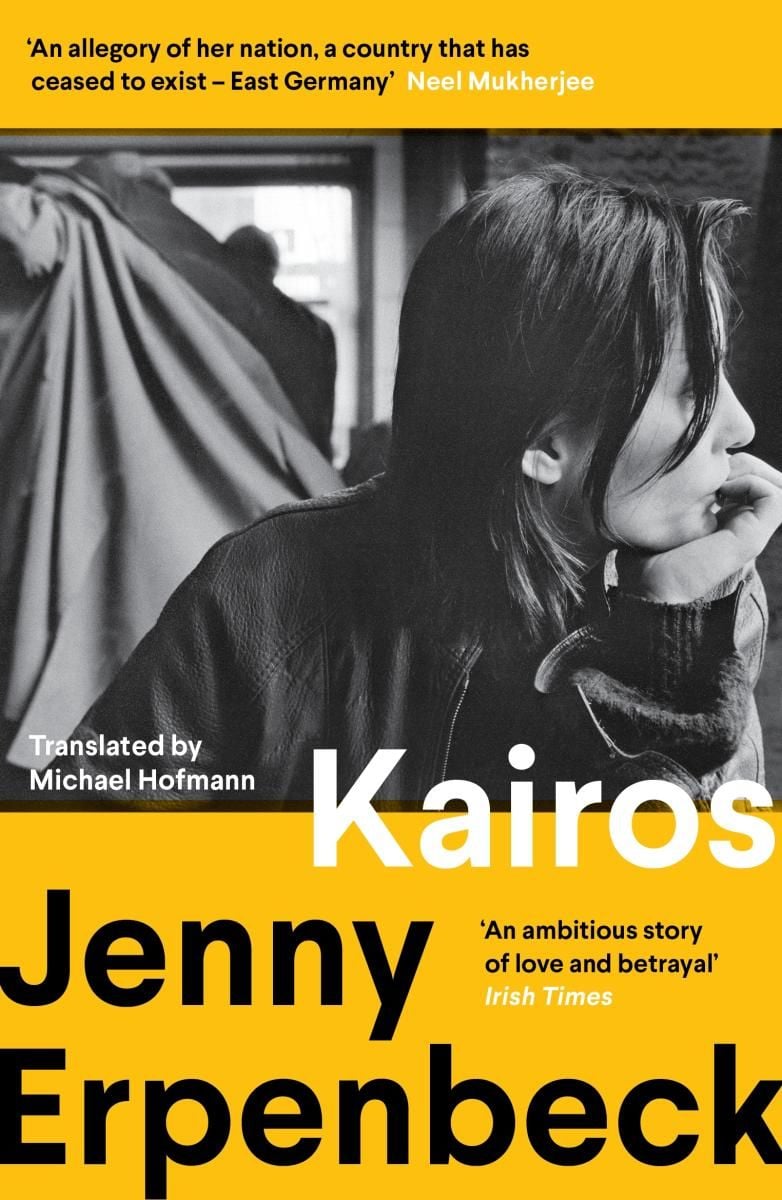 Yellow book cover of Kairos by Jenny Erpenbeck with a black and white photo of a woman.